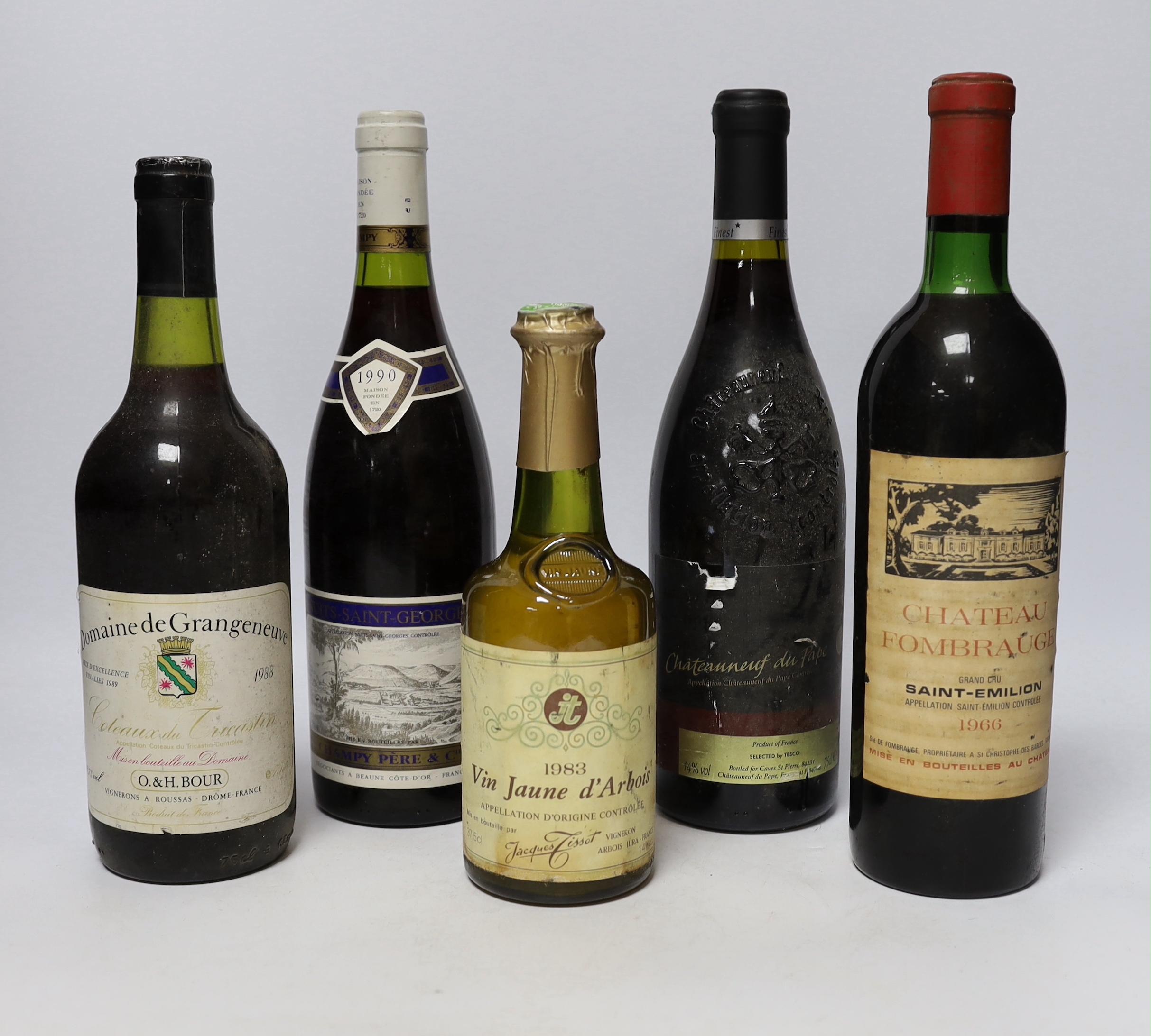 A bottle of Nuits Saint-Georges 1990 red wine, a bottle of Chateau Fombrauge, Saint-Emilion Grand Cru 1966, a bottle of Domaine de Grangeneuve 1988 and two other bottles of wine (5)